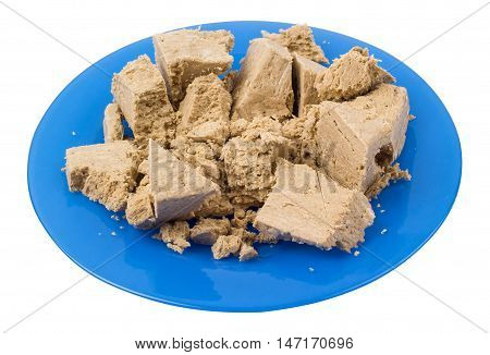 Halvah in a plate isolated d d