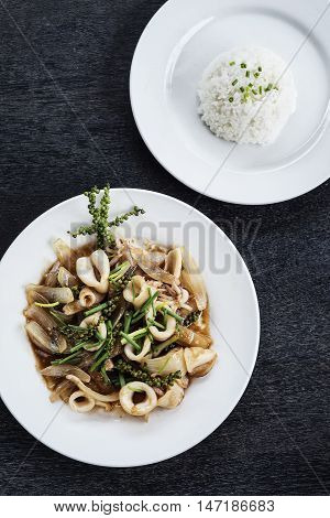 fresh squid and kampot green pepper stir fry traditional asian cambodian seafood meal