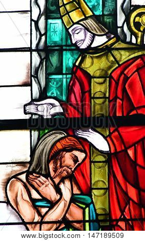 Poissy France - august 6 2016 : stained glass window of the historical collegiate church where the king Saint Louis was baptised