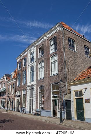 ZWOLLE, NETHERLANDS - AUGUST 31, 2016: Historical buildings at a canal in Zwolle, The Netherlands
