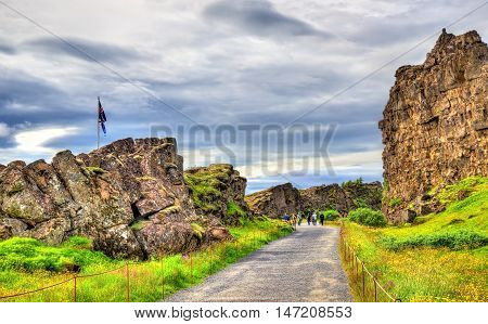 Road in a fissure between tectonic plates in the Thingvellir National Park, Iceland