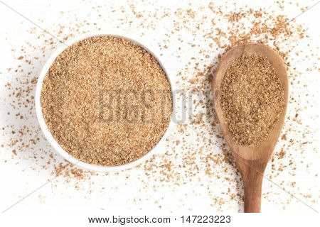 Ground Wheat into a bowl isolated in white background. Trigo para quibe. Kibbeh