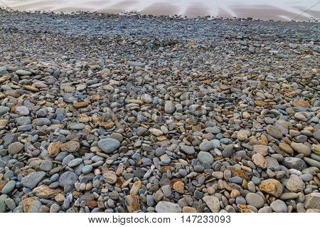 Pebbles and stones on beach. Fairbourne Wales United Kingdom