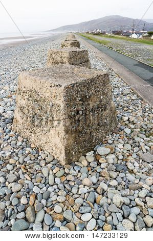 Anti-tank cubes from World War II to prevent invasion. Fairbourne beach North Wales United Kingdom Europe