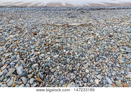 Pebbles and stones on beach. Fairbourne Wales United Kingdom