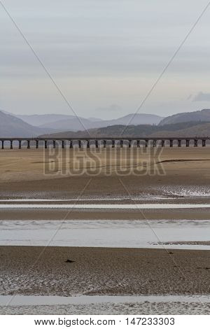 Estuary and railway viaduct. Mawddach Estuary Fairbourne Wales United Kingdom
