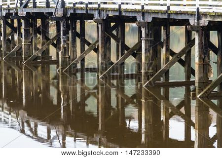 Wooden structure Penmaenpool toll bridge over the River Mawddach near Dolgellau Wales United Kingdom