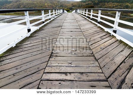 Wooden structure Penmaenpool toll bridge over the River Mawddach near Dolgellau Wales United Kingdom