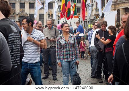 BELGIUM, BRUSSELS - SEPTEMBER 07, 2014: Belgian Beer Weekend 2014. The most famous beer festival in Belgium. Happy woman at the festiwal.