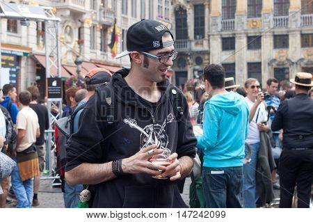 BELGIUM, BRUSSELS - SEPTEMBER 07, 2014: Belgian Beer Weekend 2014. The most famous beer festival in Belgium. Man at the festiwal.