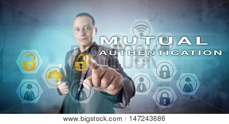 Friendly but busy corporate security manager is initiating MUTUAL AUTHENTICATION onscreen. Information technology concept and communications metaphor for computer and network access control methods.