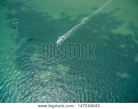 Aerial view of Kite surfing in the shallows of the island Koh Phangan Thailand