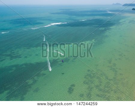 Aerial view of Kite surfing in the shallows of the island Koh Phangan Thailand