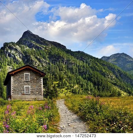 old shelter in in mountains landscape near Rhemes Notre Dame
