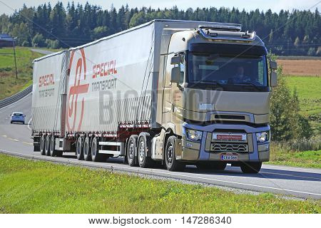 SALO FINLAND - SEPTEMBER 11 2016: Renault Trucks T and Ahola Special Transport trailer trucking along the road in South of Finland