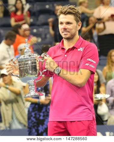 NEW YORK - SEPTEMBER 11, 2016: Three times Grand Slam champion Stanislas Wawrinka of Switzerland during trophy presentation after his victory at US Open 2016 final match at National Tennis Center