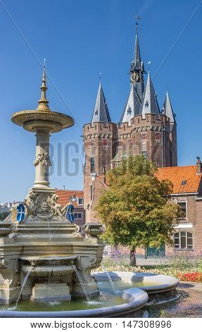 Old City Gate Sassenpoort And Foutain In Zwolle
