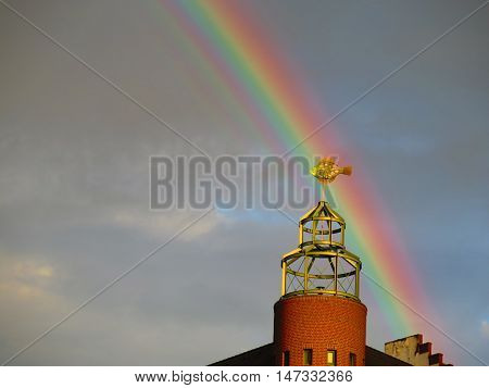 Weathercock in the shape of a fish on an apartment house on St. Pauli Fischmarkt in Hamburg Germany