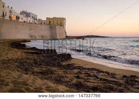 Beach city Gallipoli at sunset on a summer day