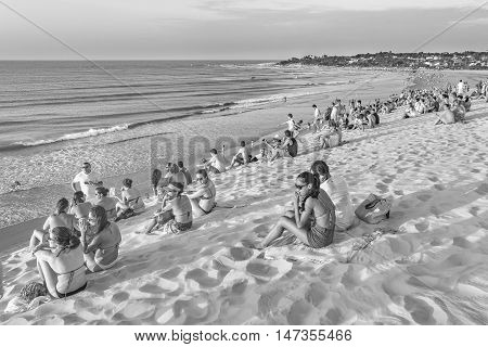 JERICOACOARA, BRAZIL, DECEMBER - 2015 - People at beach in the famous dune of Jericoacoara waiting to see the sunset