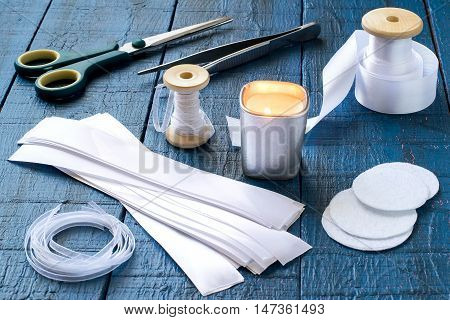 Making beautiful bows for decoration hair and gifts in the art kanzashi. Step by step photo instructions. Step 2. Cutting the ribbon pieces burning the edges