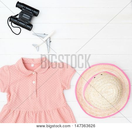 Little girl explorer fashion object top view with copy space.