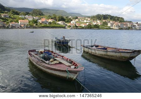 Fishing boats in the ria in Combarro a village of the province of Pontevedra in the Galicia region of Spain.