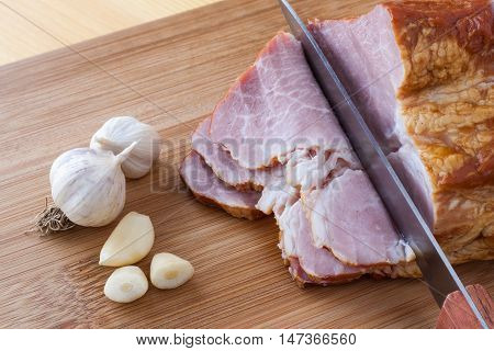 Boiled, Smoked Pork Meat, Pork Neck, Garlic And A Knife .