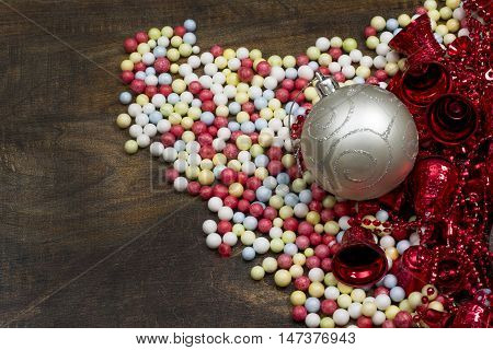 Christmas Balls with colorful balls wooden background.
