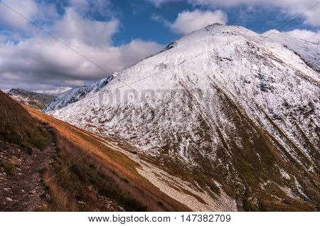 Beautiful autumn mountain landscape. Tatra mountains. First snow.