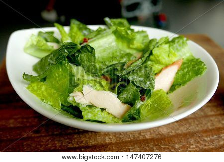 Chicken, Meat, Lettuce Delicious Ceasar Salad In White Dish