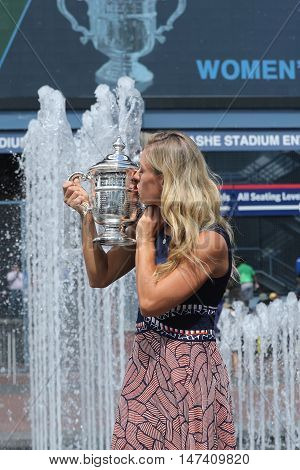 NEW YORK - SEPTEMBER 11, 2016:Two times Grand Slam champion Angelique Kerber of Germany posing with US Open trophy after her victory at US Open 2016 at Billie Jean King National Tennis Center