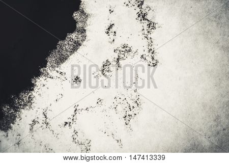 deliquescent ink blot on a white background