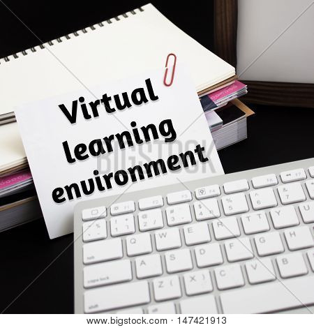 Word text Virtual learning environment on white paper card / business concept