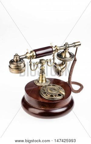 Phone in a retro style on an isolated studio backround