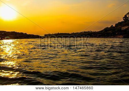 Beautiful sunset at mountain nearby the river with the golden light