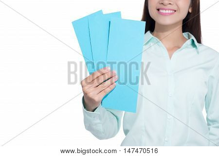 woman hand holding blank airline boarding pass ticket isolated over white background