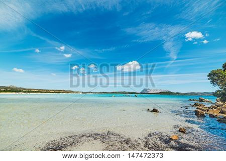 soft clouds over Lu Impostu beach Sardinia