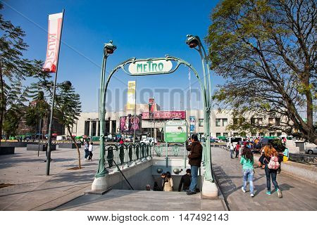 MEXICO CITY, MEXICO - DEC 6, 2015: People enter subway station in Zocalo , Mexico city on Dec 6, 2015. Mexico.