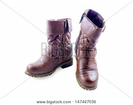 A pair of brown boots isolated on a white background. with clipping path.