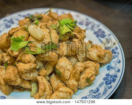 Fried sliced pork or chicken with garlic.Bangkok food.Thailand food.