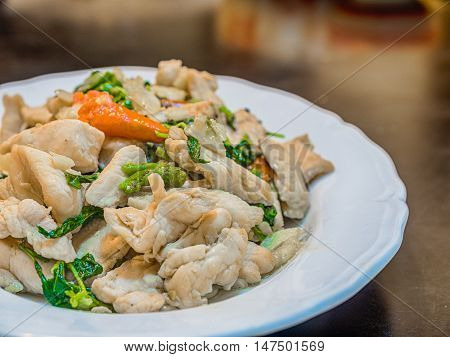 Spicy fried chicken with basil leaves.Bangkok food.Thailand food.
