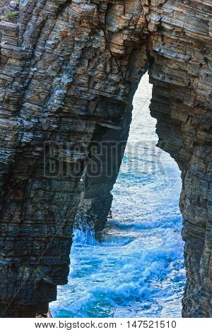 Natural Arches On Beach.