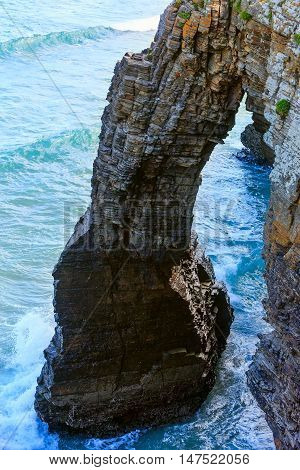 Natural Arches On Beach.