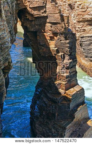 Natural Arches On Beach.