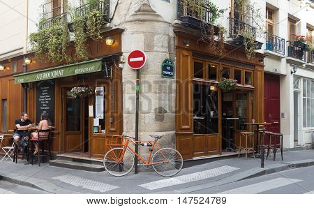 Paris France-September 10 2016: the traditional French cafe Au Bougnat set in a rustic bistro style located near Notre Dame cathedral on the isle de la Cite in the 4th district of Paris.