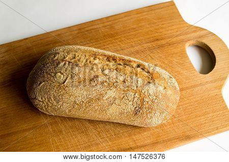 Delicious and warm bread on the desk