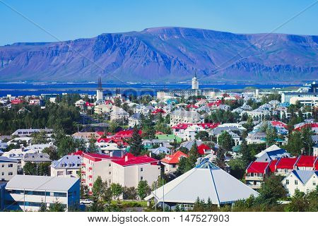 Beautiful Super Wide-angle Aerial View Of Reykjavik, Iceland With Harbor And Skyline Mountains And S