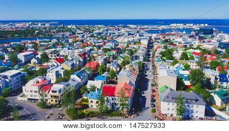 Beautiful Super Wide-angle Aerial View Of Reykjavik, Iceland With Harbor And Skyline Mountains And S