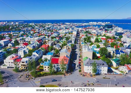 Beautiful Super Wide-angle Aerial View Of Reykjavik, Iceland With Harbor And Skyline Mountains And S